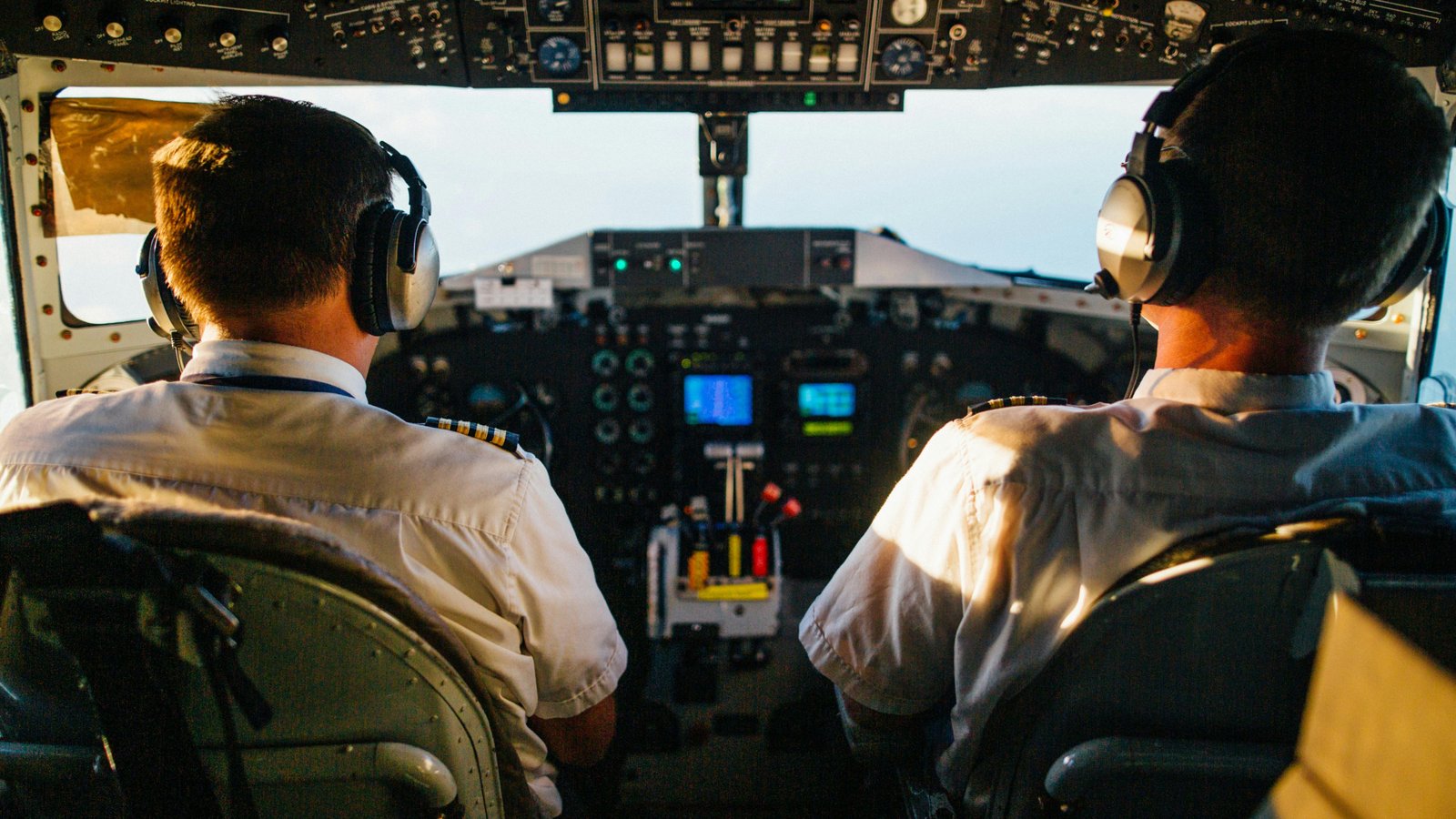 Pilot mentoring an aviation student